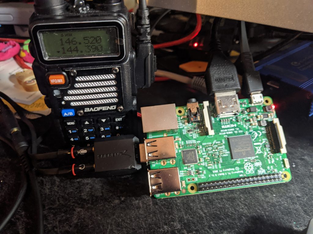 APRS setup showing a Baofeng radio and Pi 3